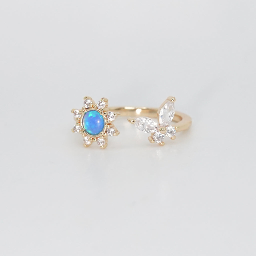 Sweetwater Ring - Opal centerpiece with butterfly and shimmering stones.