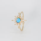 Cavalleri Ring - Opal center surrounded by a star motif in silver.