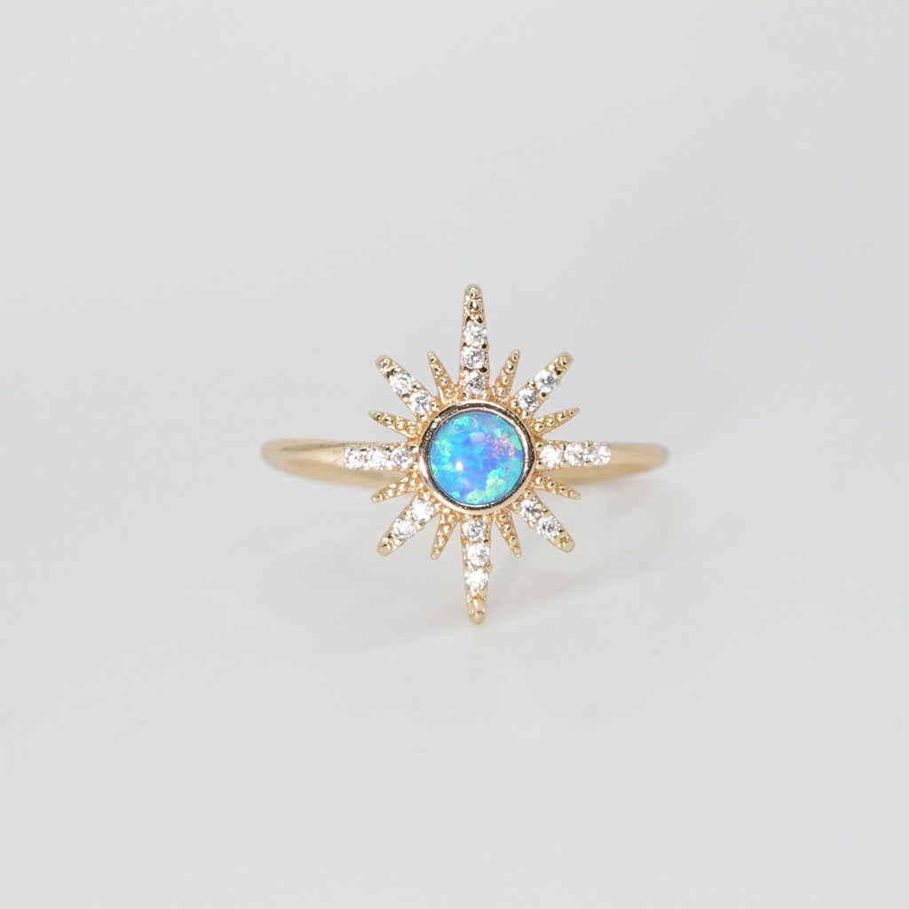 Cavalleri Ring - Opal center surrounded by a star motif in silver.