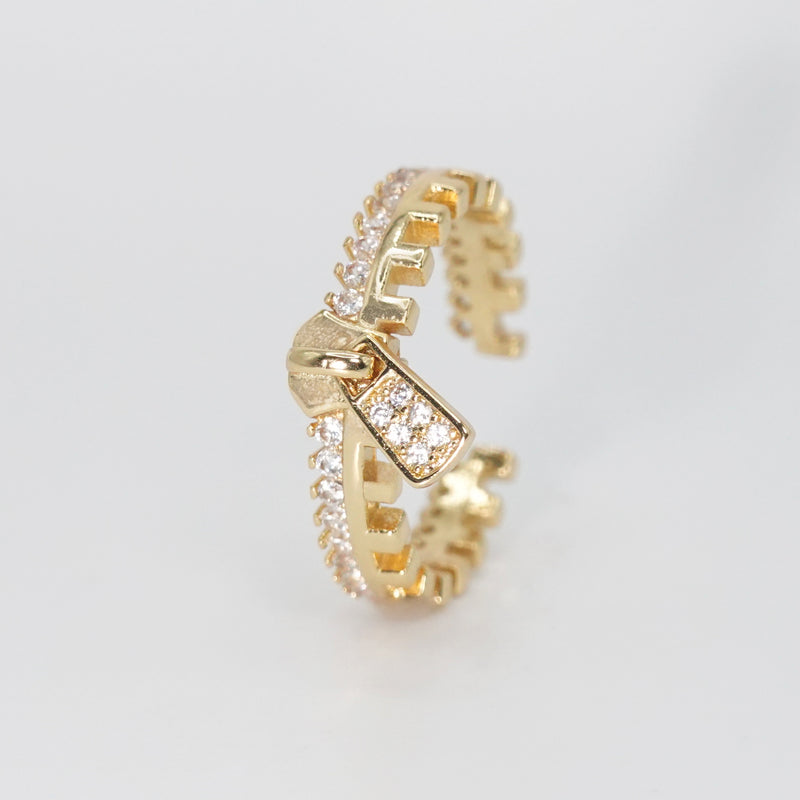 Reefer Ring - Zipper-shaped design with shiny stones.