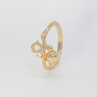 Cuthbert Ring - Sterling silver ring with attached tulip motif.