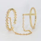 Andromeda Ring - Celestial-inspired accessory with interconnected rings and chain.
