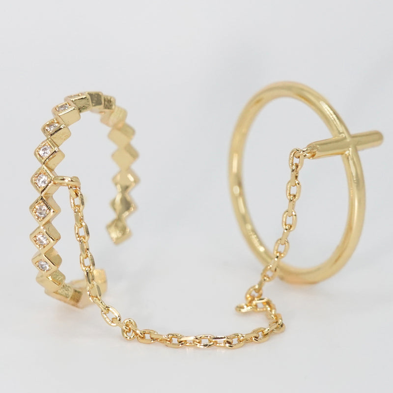 Andromeda Ring - Celestial-inspired accessory with interconnected rings and chain.