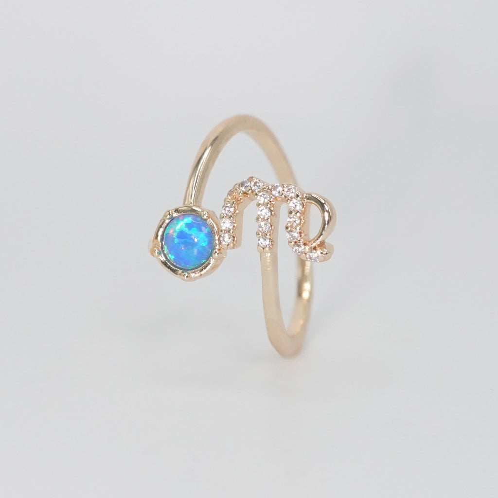 Virgo Ring: Maiden symbol with shimmering stones surrounding an opal, epitome of perfection.