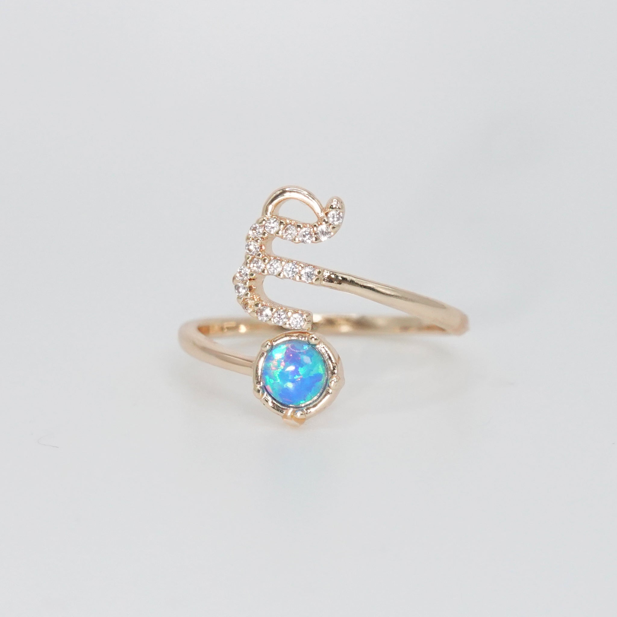 Virgo Ring: Maiden symbol with shimmering stones surrounding an opal, epitome of perfection.