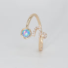 Capricorn Ring: Goat symbol with shimmering stones surrounding an opal, epitome of ambition.