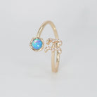 Aquarius Ring: Water symbol in opal and shimmering stones, epitome of individuality.