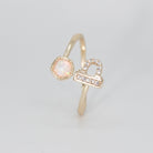  Libra Ring: Scales symbol with shimmering stones surrounding an opal, epitome of balance.