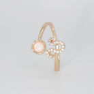 Leo Ring: Lion symbol with shimmering stones surrounding an opal, epitome of confidence.