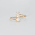 Pisces Ring: Fish symbol with shimmering stones surrounding an opal, epitome of creativity.