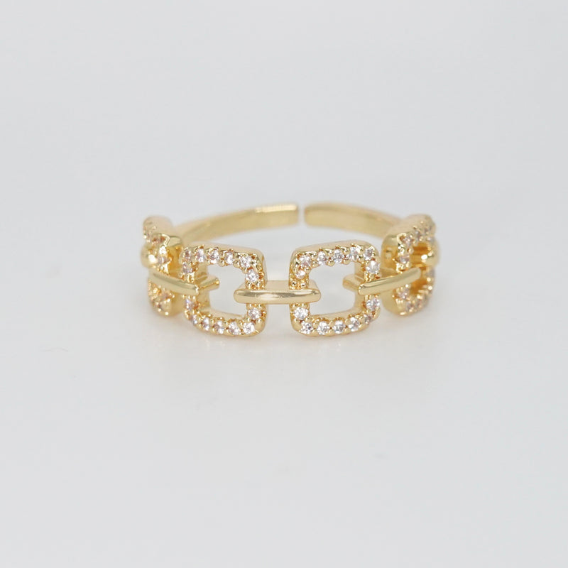 Temescal Ring: Square chains with shimmering stones, exuding glamour.