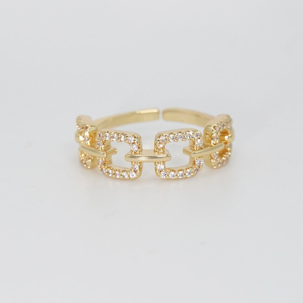 Temescal Ring: Square chains with shimmering stones, exuding glamour.
