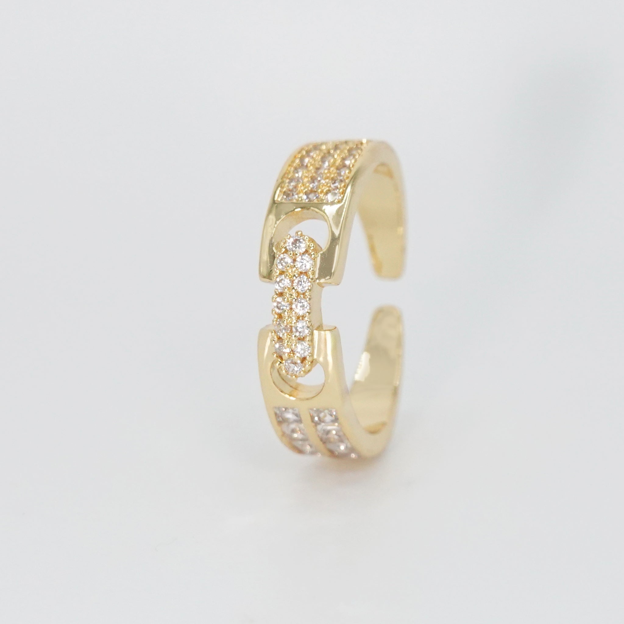 Baylor Ring: Two intricately connected pieces adorned with shimmering stones, exuding elegance and sophistication.