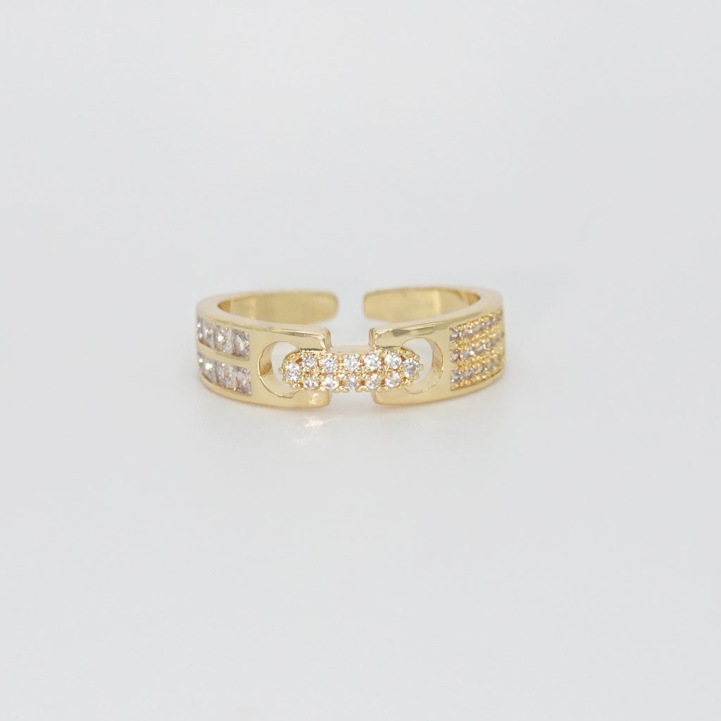 Baylor Ring: Two intricately connected pieces adorned with shimmering stones, exuding elegance and sophistication.