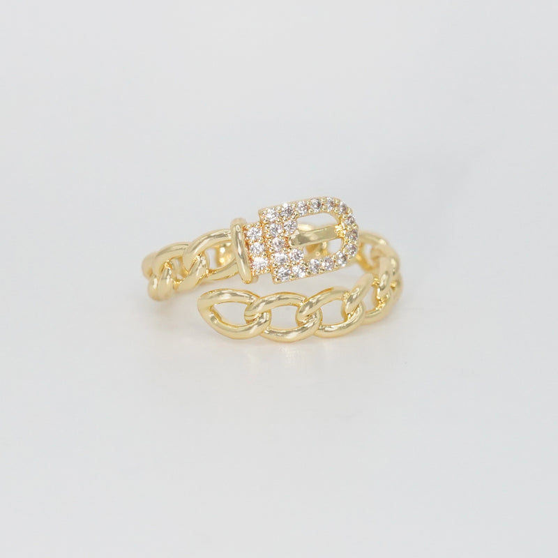  Radcliffe Ring: Chic chain and belt design adorned with dazzling stones, epitome of modern elegance.