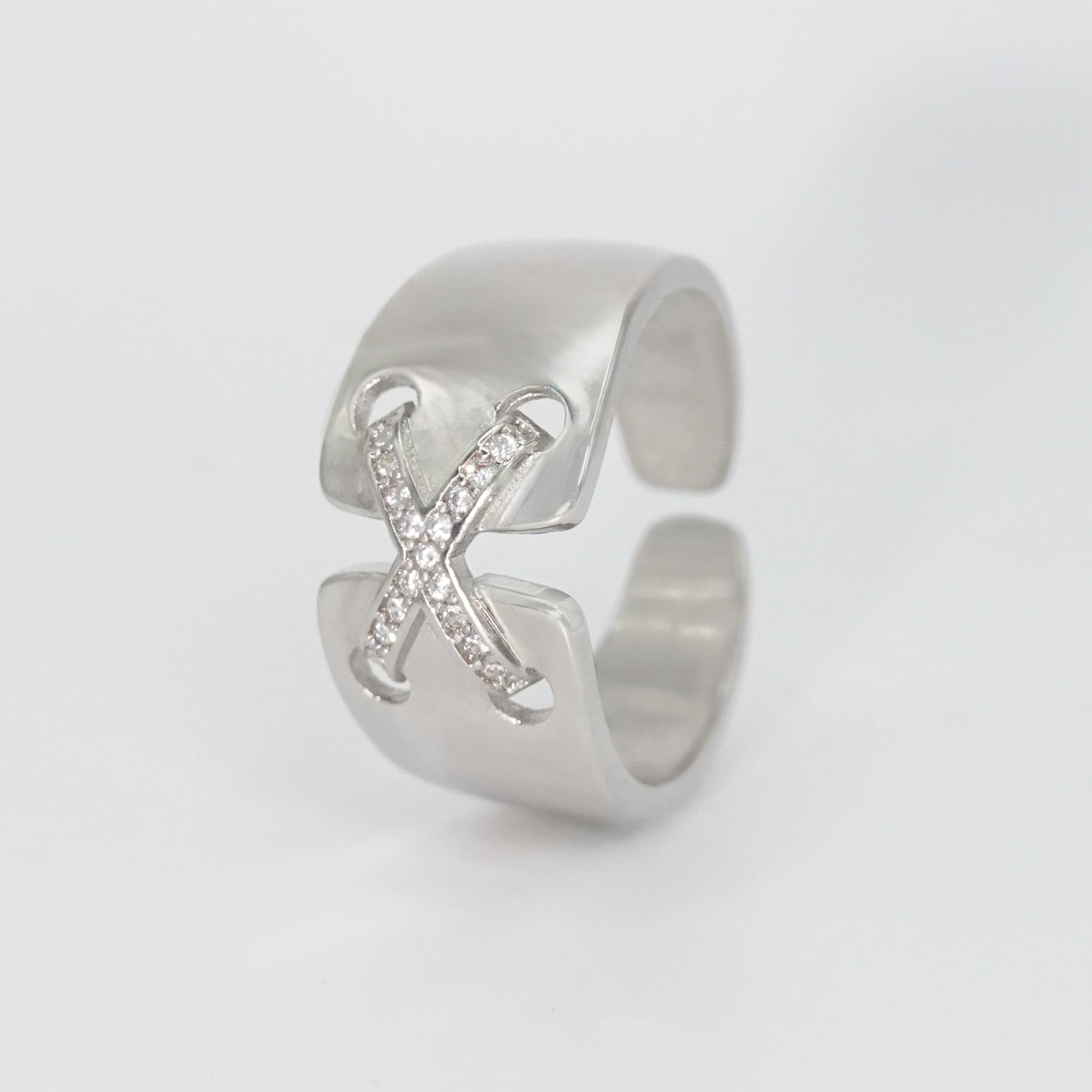 Sterling silver Stradella Ring with cross design and shimmering stones, epitome of elegance and unity.