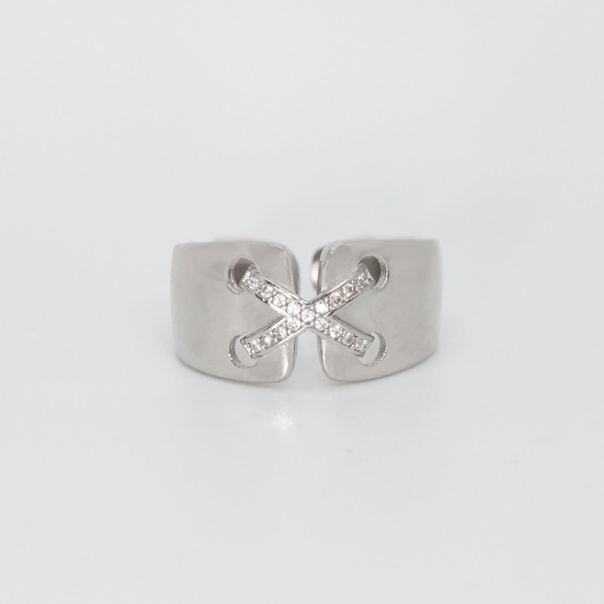 Sterling silver Stradella Ring with cross design and shimmering stones, epitome of elegance and unity.