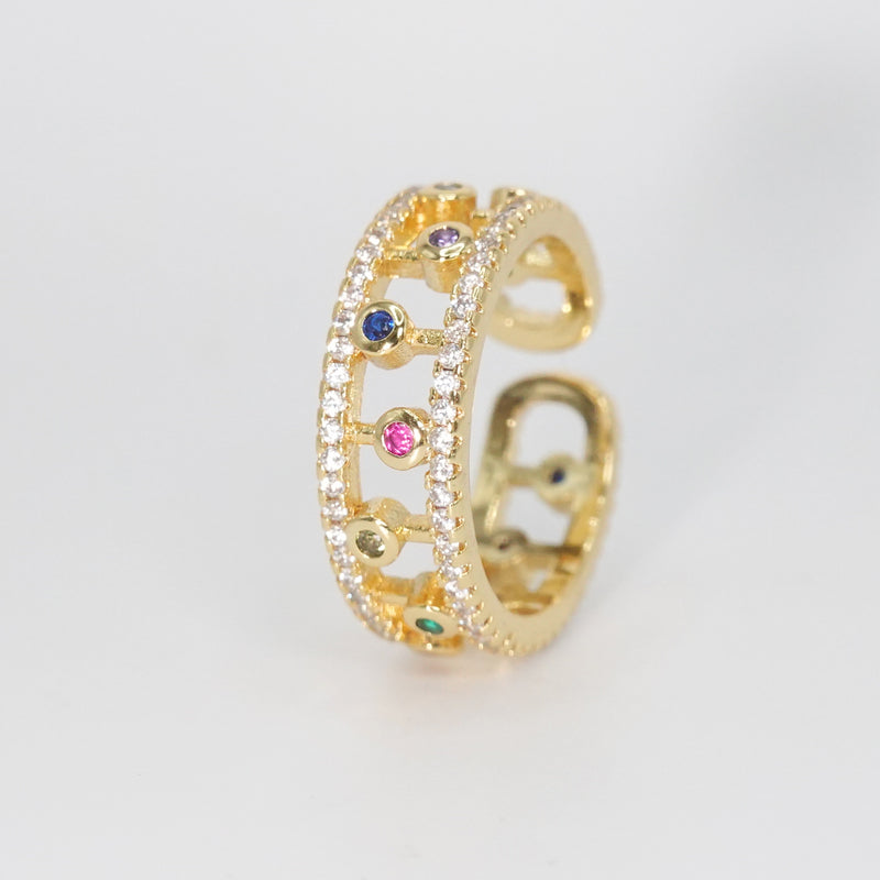 Fountain Ring - Dazzling accessory with shimmering stones and colorful circular gems.