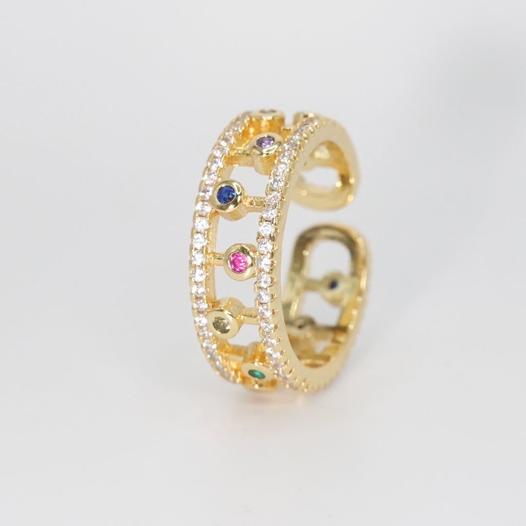 Fountain Ring - Dazzling accessory with shimmering stones and colorful circular gems.
