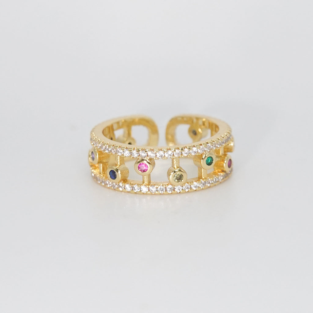 Fountain Ring - Dazzling accessory with shimmering stones and colorful circular gems.