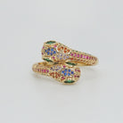 Twin serpents intertwined with shiny, colorful stones, exuding enchanting allure.