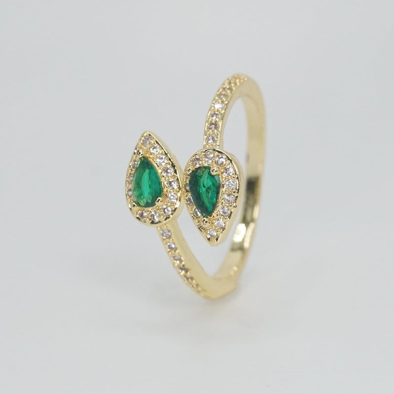 Old Topanga Ring: Twin serpents with captivating green stones at heads and shimmering stones along bodies, epitome of timeless sophistication.