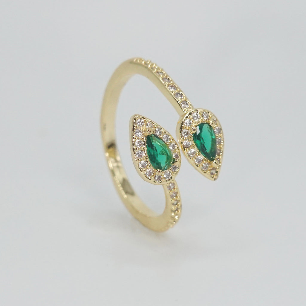 Old Topanga Ring: Twin serpents with captivating green stones at heads and shimmering stones along bodies, epitome of timeless sophistication.