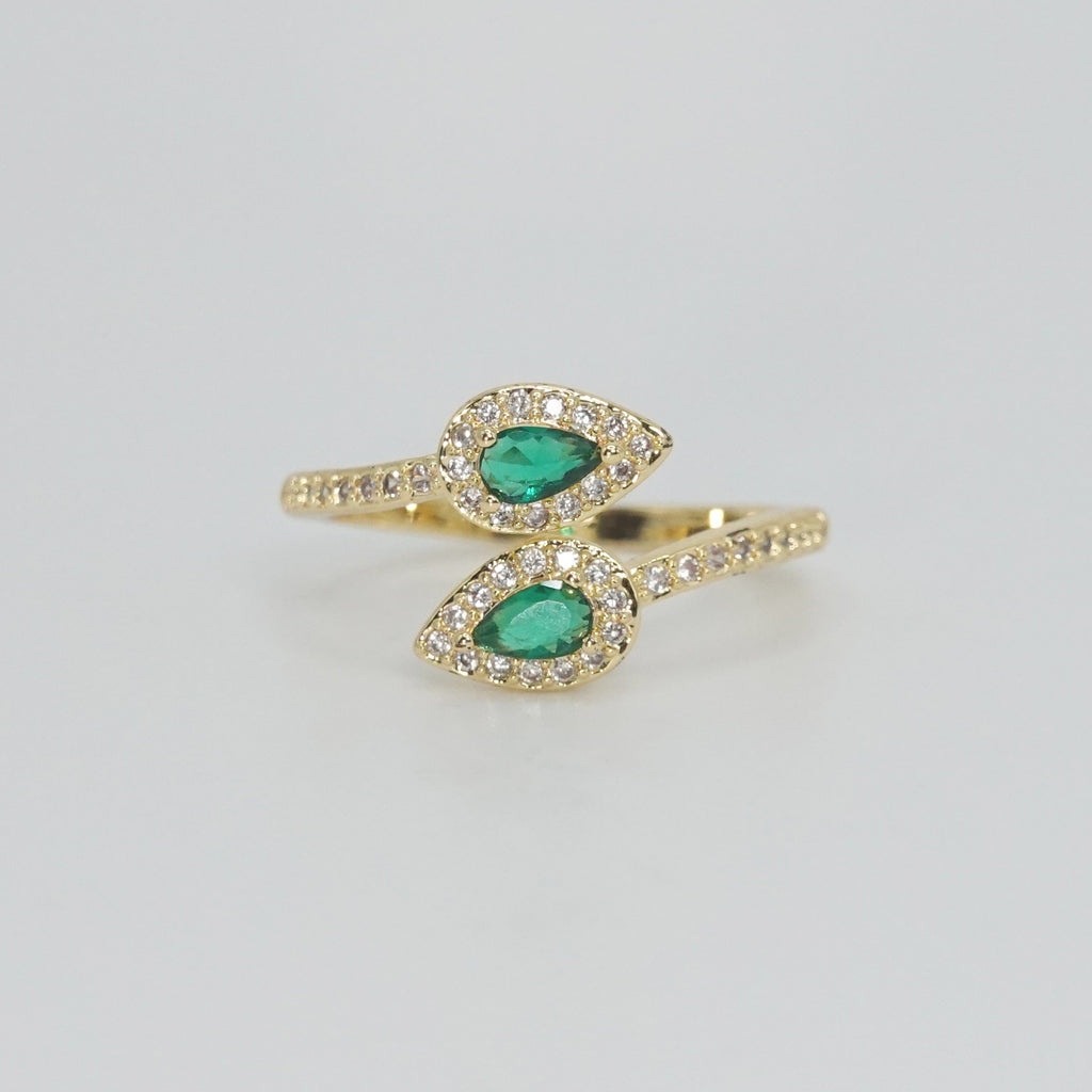 Old Topanga Ring: Twin serpents with captivating green stones at heads and shimmering stones along bodies, epitome of timeless sophistication.