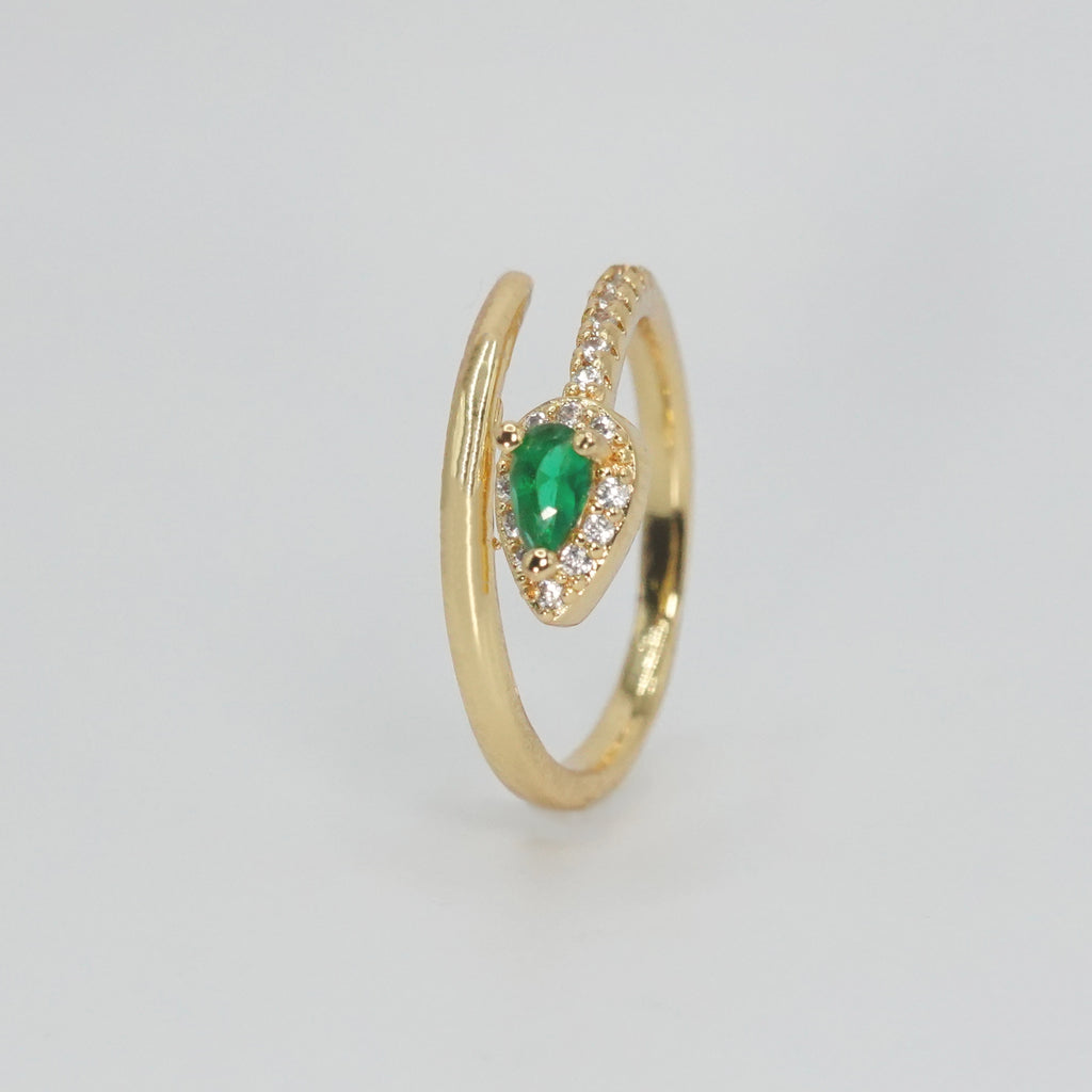 Callon Ring with snake-shaped design and stunning green gemstone, exuding mystique and sophistication.