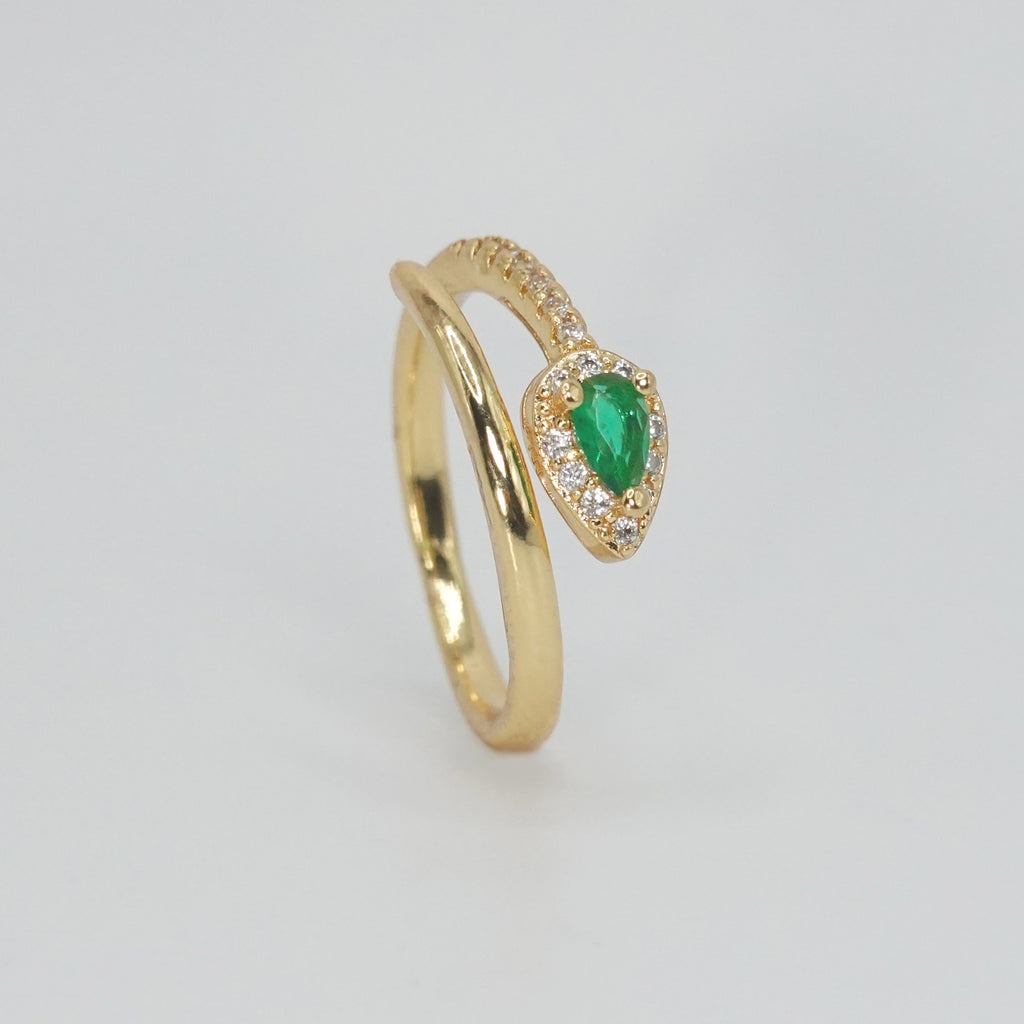 Callon Ring with snake-shaped design and stunning green gemstone, exuding mystique and sophistication.