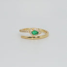 Callon Ring with snake-shaped design and stunning green gemstone, exuding mystique and sophistication.