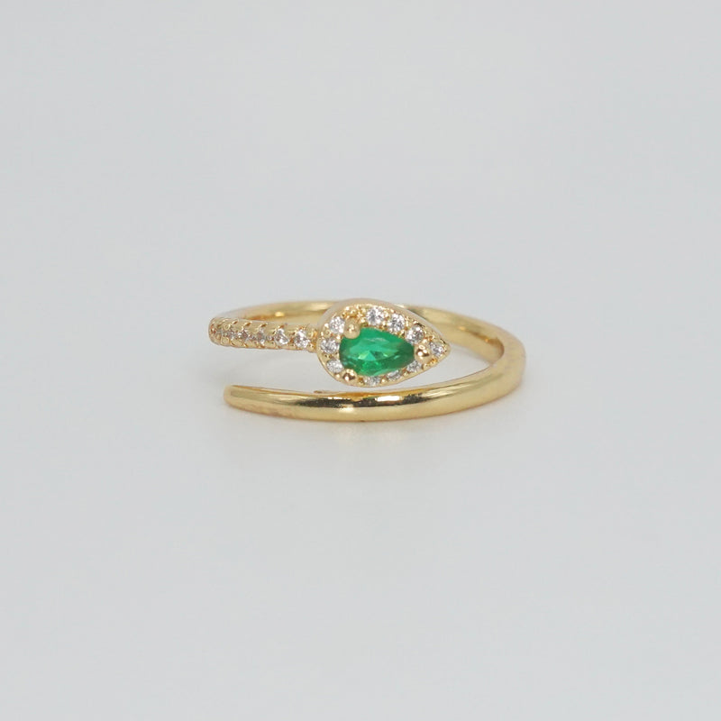 Callon Ring with snake-shaped design and stunning green gemstone, exuding mystique and sophistication.