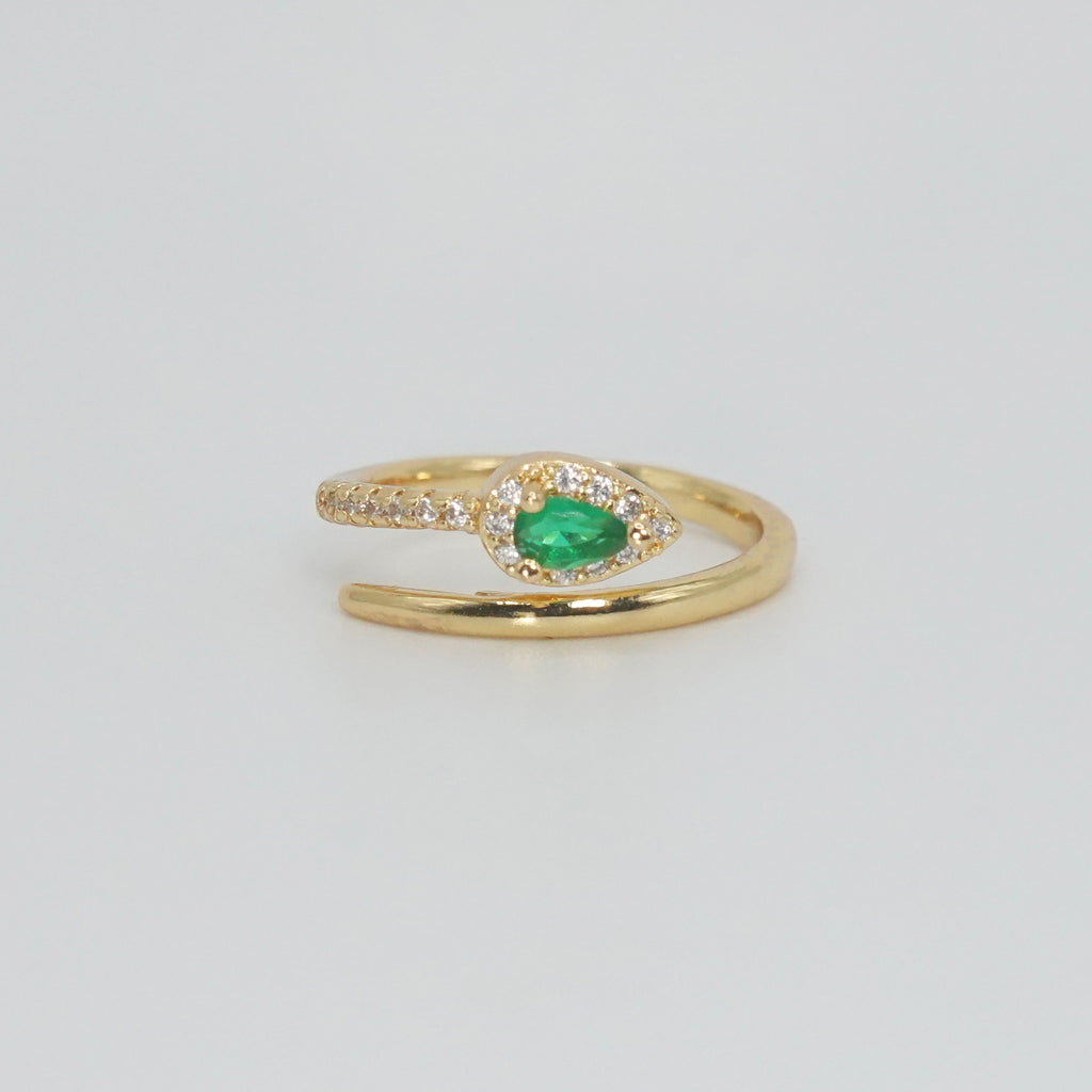 Callon Ring with snake-shaped design and stunning green gemstone, exuding mystique and sophistication.