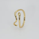 Colina Ring: Sleek snake-shaped design adorned with sparkling stones, exuding captivating allure.