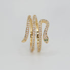 Rolling snake-shaped design with shimmering stones, epitome of elegance and mystique.
