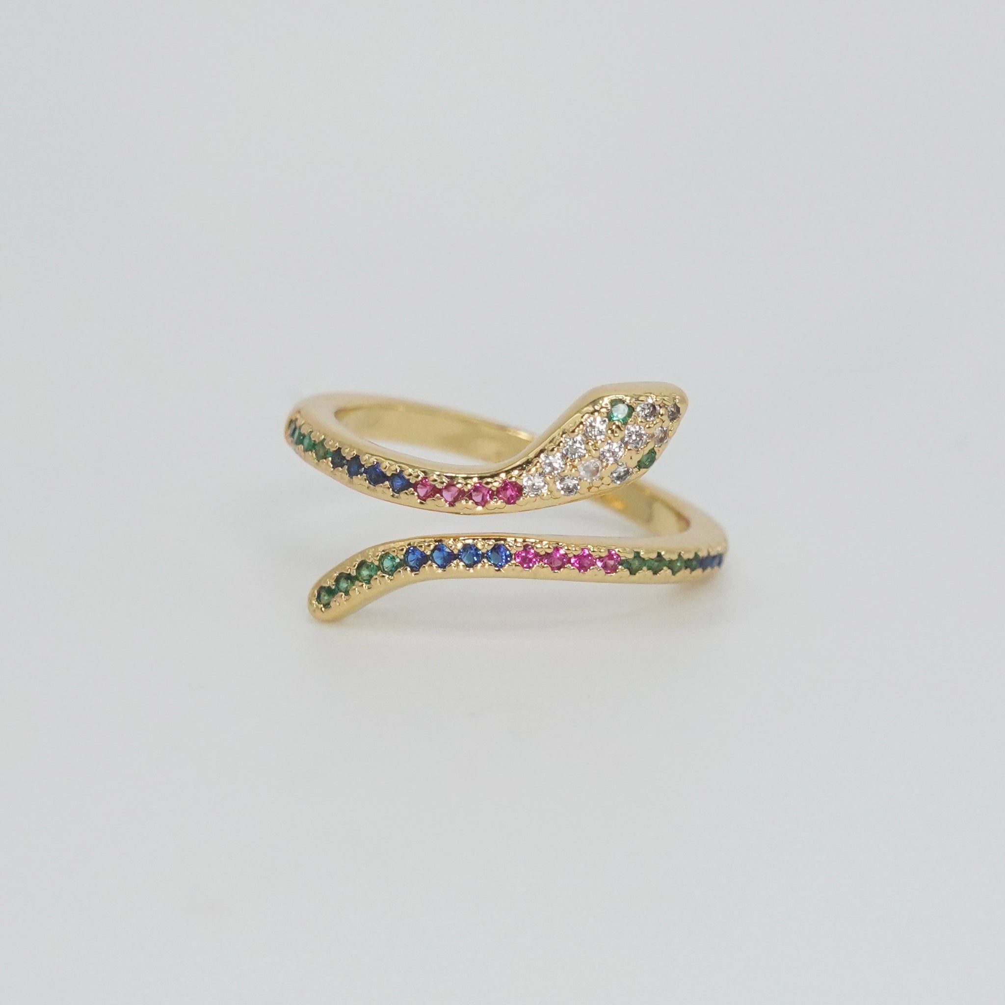 Shady Ring: Sinuous snake design adorned with colorful, shimmering stones, exuding mystery and charm.