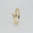 Viewridge Ring: Slender serpent-inspired design, epitome of understated elegance.