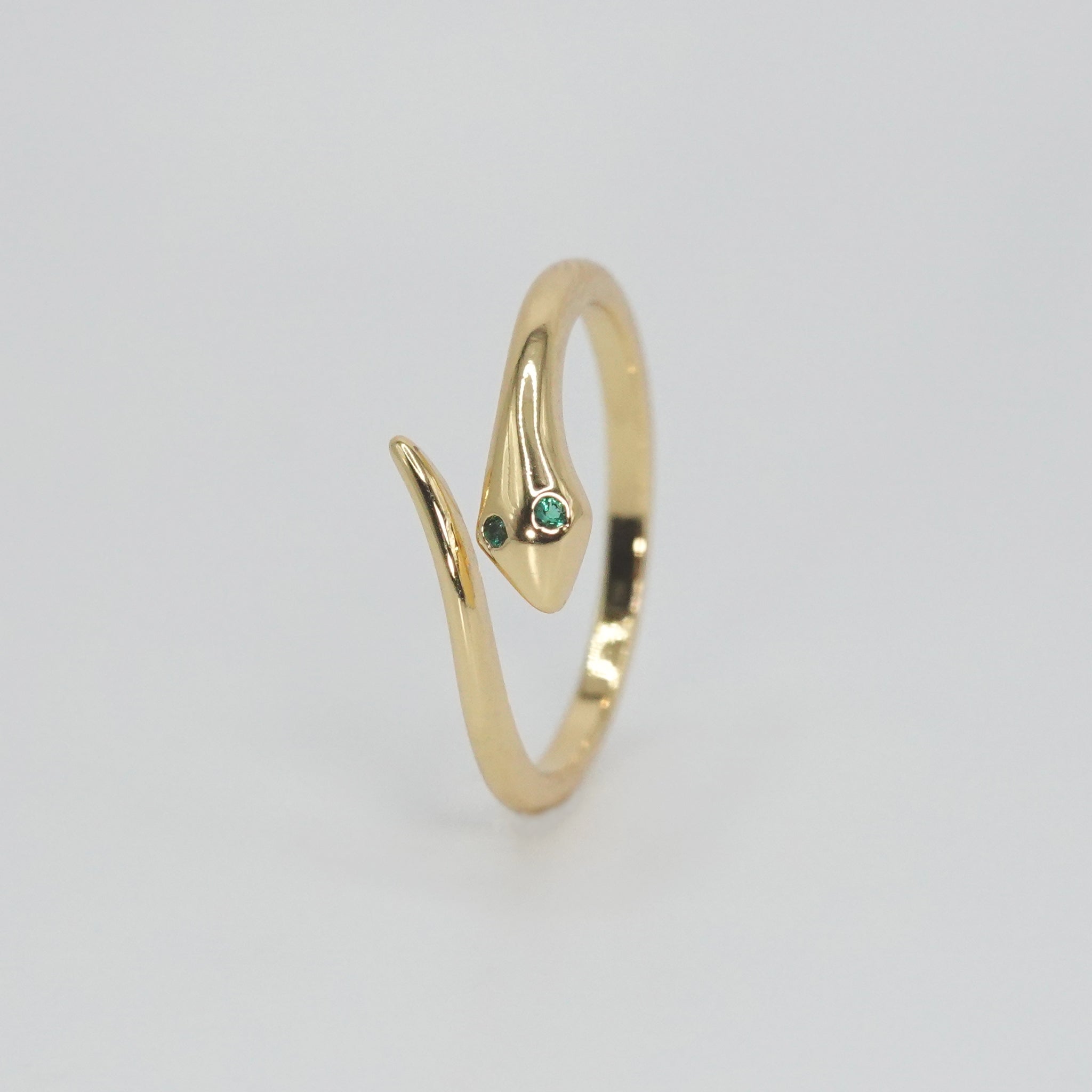Viewridge Ring: Slender serpent-inspired design, epitome of understated elegance.