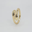 Zuniga Ring: Minimalist snake-inspired design, epitome of timeless charm.