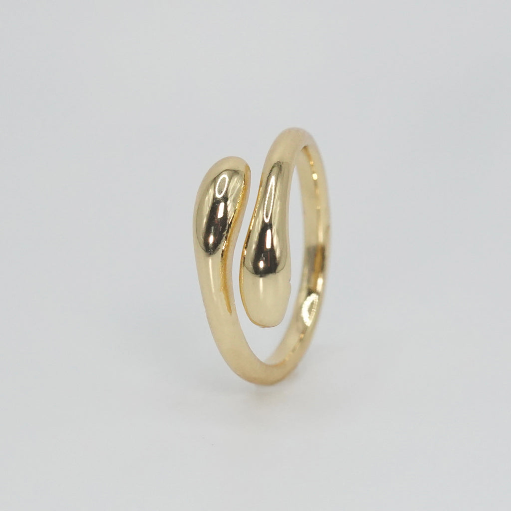 Zuniga Ring: Minimalist snake-inspired design, epitome of timeless charm.