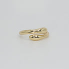 Zuniga Ring: Minimalist snake-inspired design, epitome of timeless charm.
