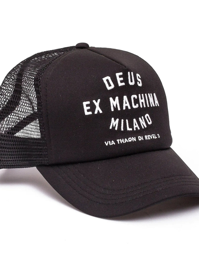 Image of the 'Deus Ex Machina - Milano Address Trucker Hat', showcasing the Deus Milano address embroidery on the front and the breathable nylon mesh back.