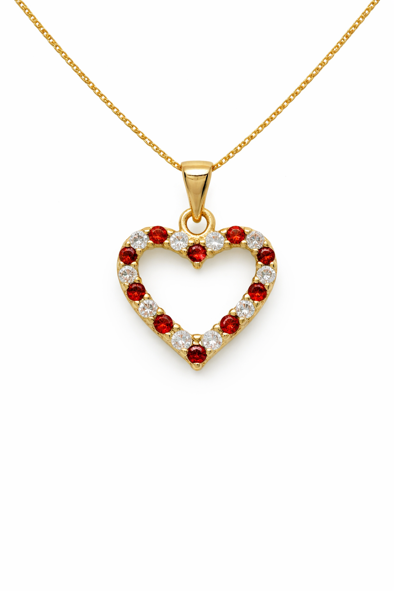 Heart-shaped pendant with red and clear stones on a gold chain against a white background