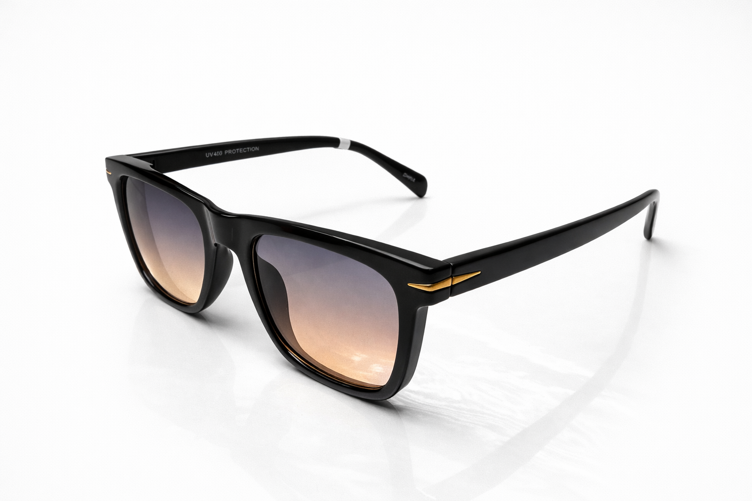 Black sunglasses with gradient lenses on a white background