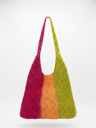 Colorful crocheted bag with a gradient from pink to green on a white background
