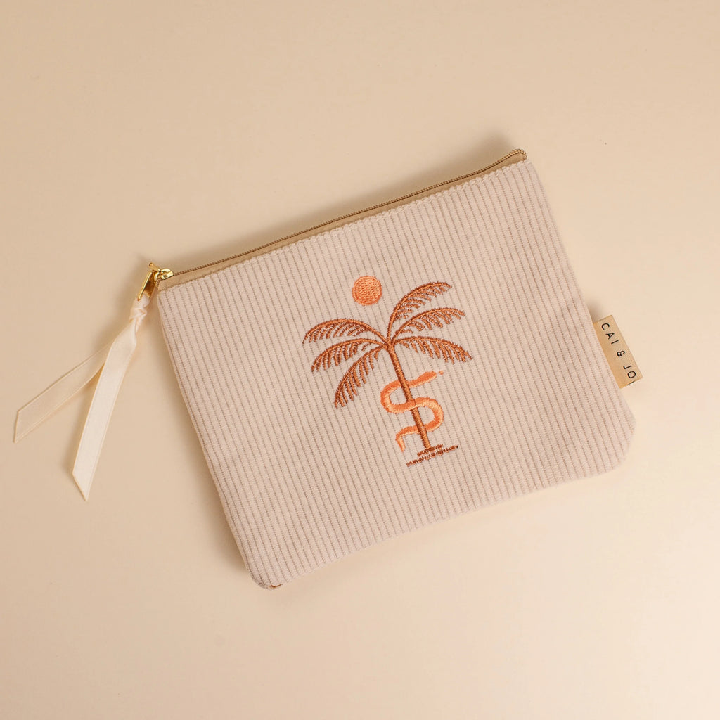 'Palma Corduroy Pouch' made from soft corduroy, featuring a palm leaf design