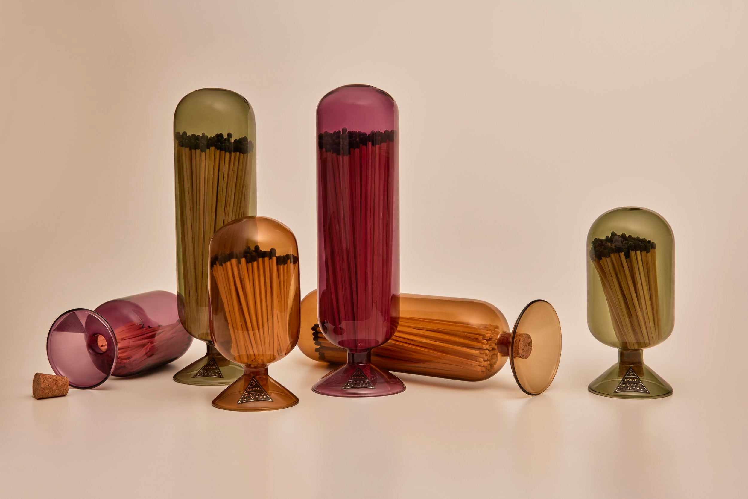 Mulberry Fireplace Matches in a stylish glass cloche with a deep mulberry hue, perfect for decorating your home.