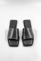 Lenny Sandals displayed in both suede and leather options, showcasing their luxurious materials and classic design.