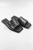 Lenny Sandals displayed in both suede and leather options, showcasing their luxurious materials and classic design.