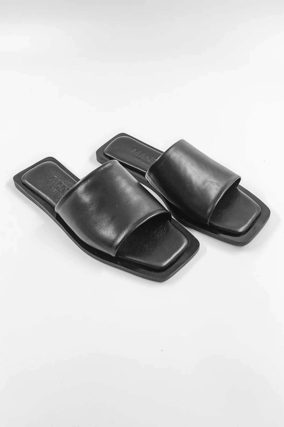 Lenny Sandals displayed in both suede and leather options, showcasing their luxurious materials and classic design.